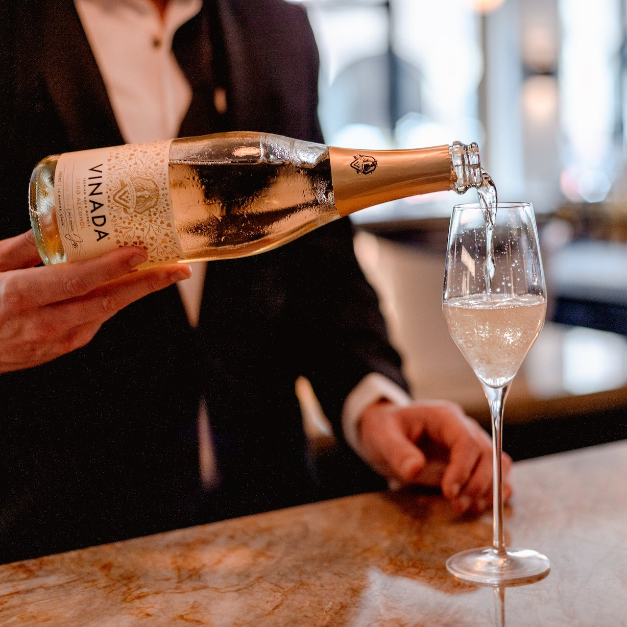 VINADA Champagne stopper. Guldfärgad i metall.